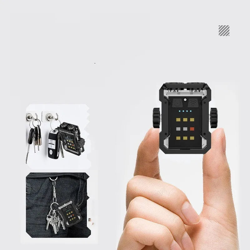 Black aluminium keychain flashlight with USB-C charging port and built-in keyring attachment