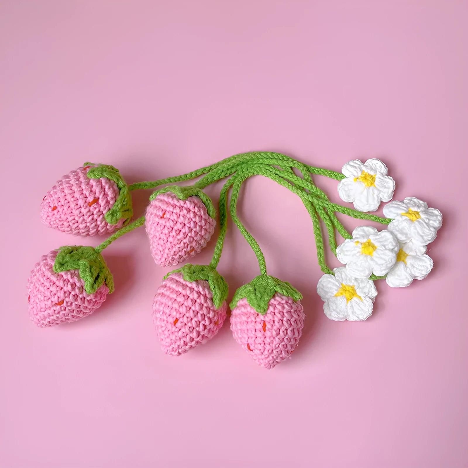 Wool crochet strawberry pendant necklace with woven design measuring 35cm in pink or red colour