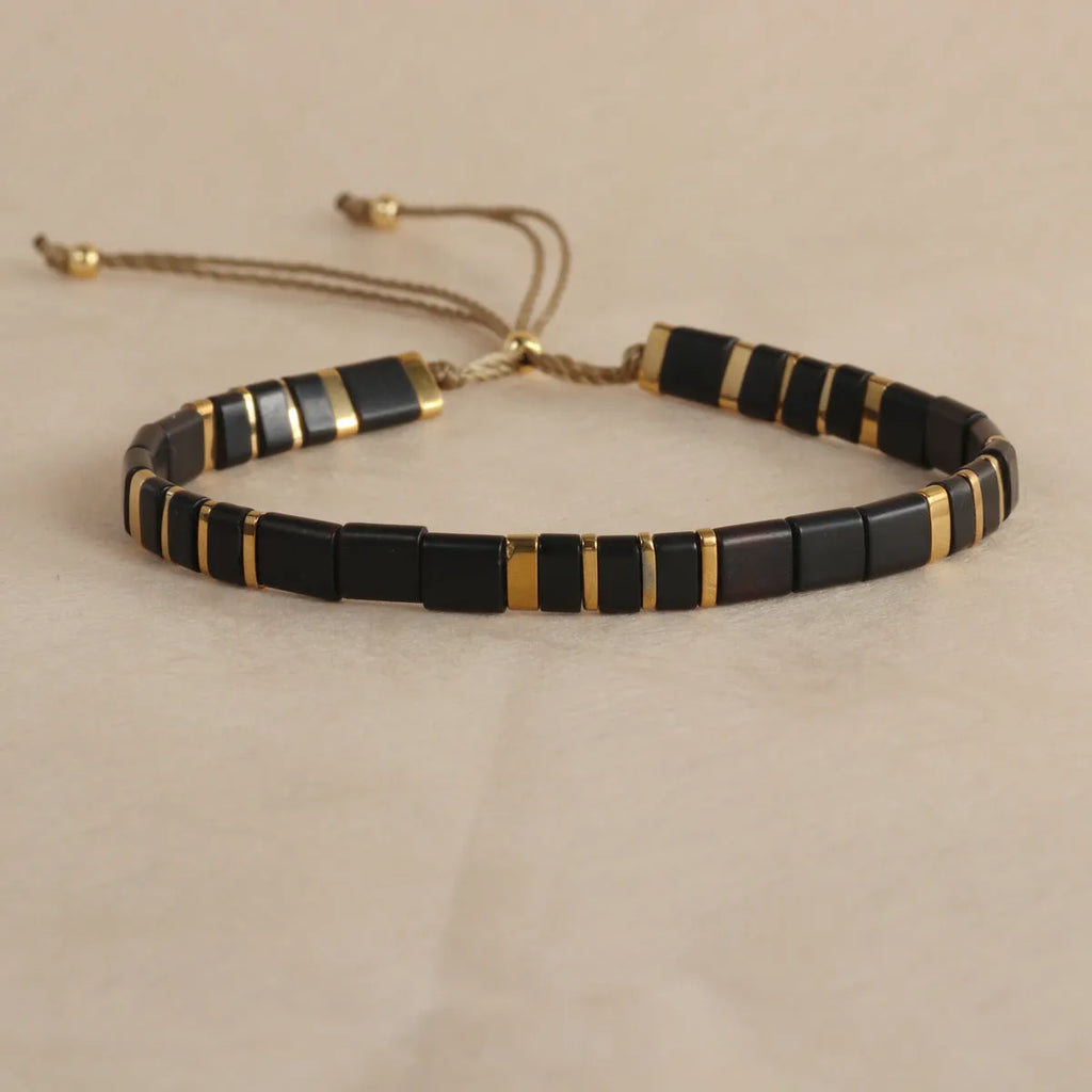 Geometric glass beaded bracelet in five colour options with pull beads adjustment