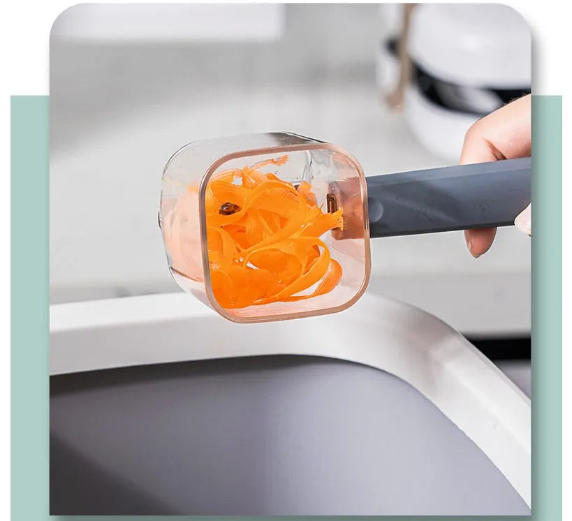 Stainless steel kitchen peeler with creative design in green, grey, and red colour options