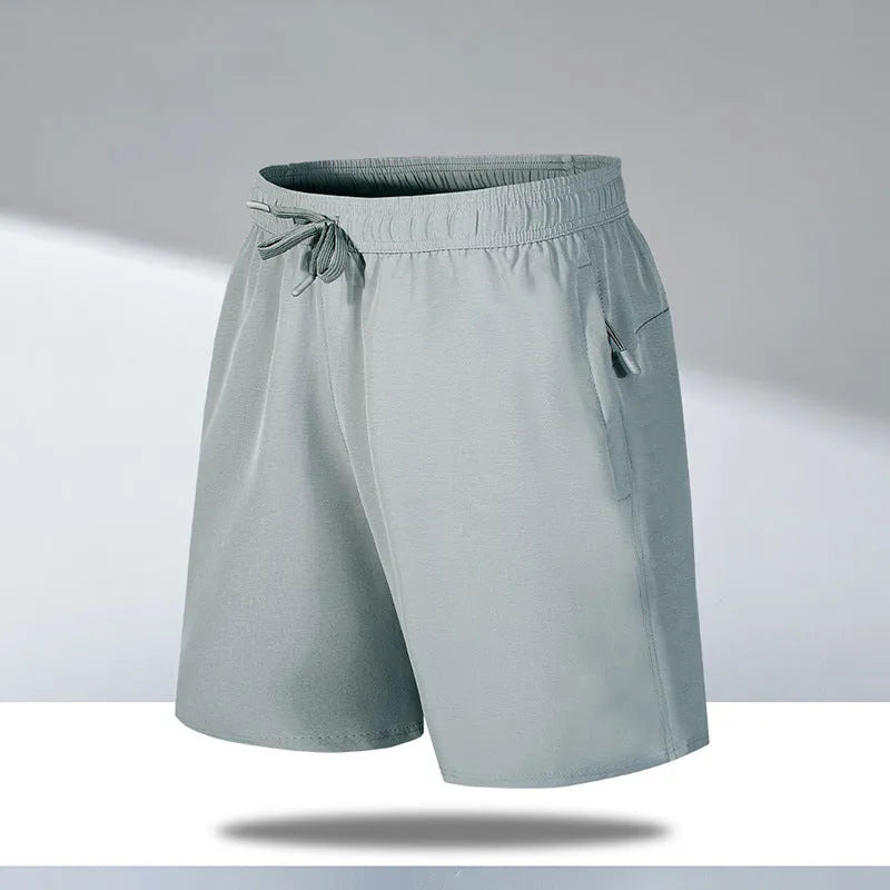 Men's loose fit quick-dry sports shorts in polyester fibre available in multiple colours and sizes