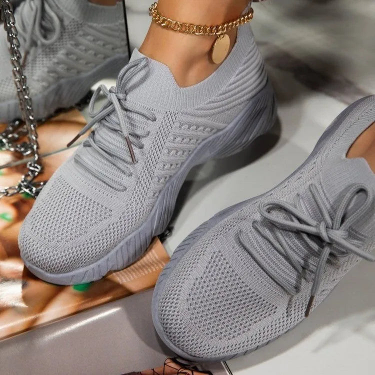 Women's thick-soled solid colour dad sneaker in multiple colour options on a white background.