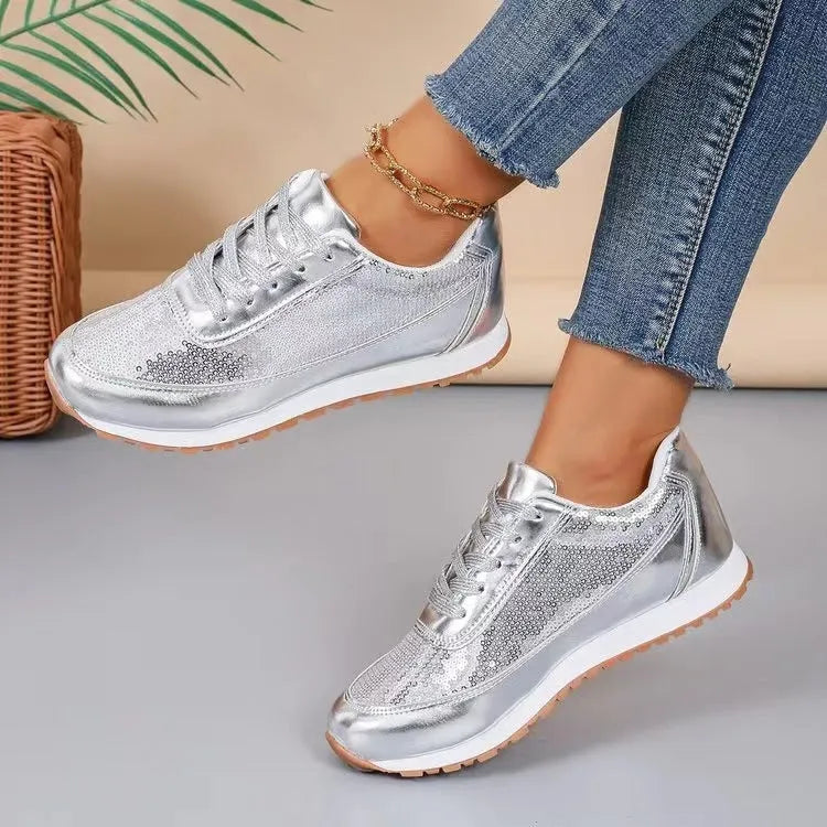 Women's thick-soled black PU leather sneaker with a square toe on a white background.