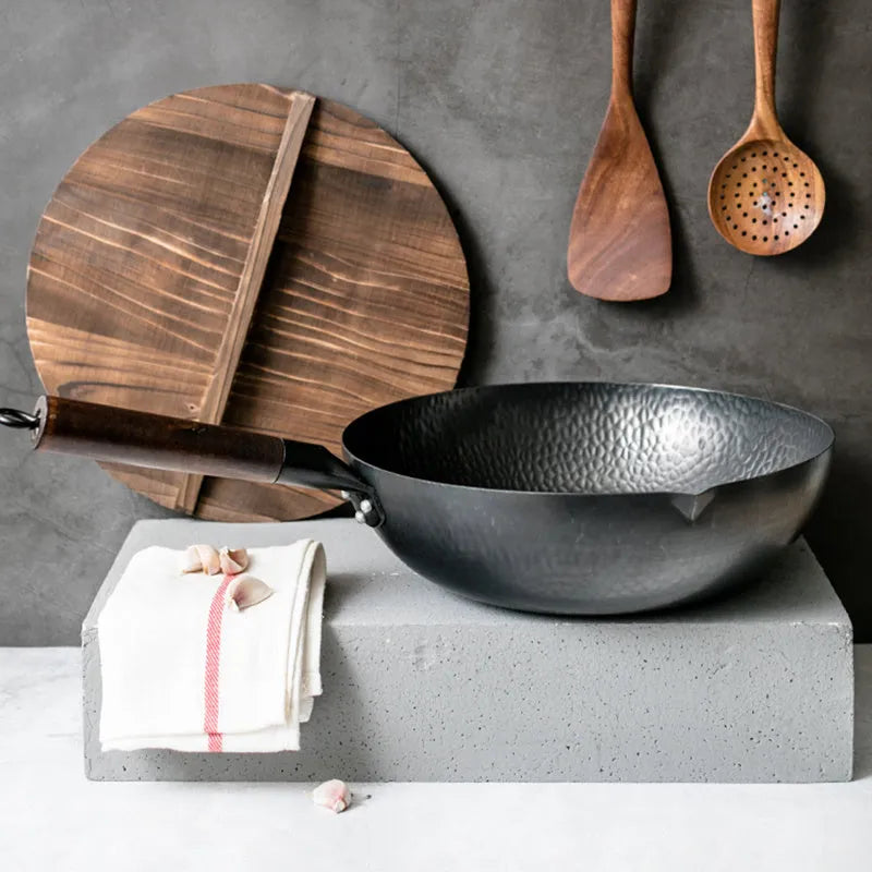 Traditional black iron wok with long wooden handle, 32cm cooking surface