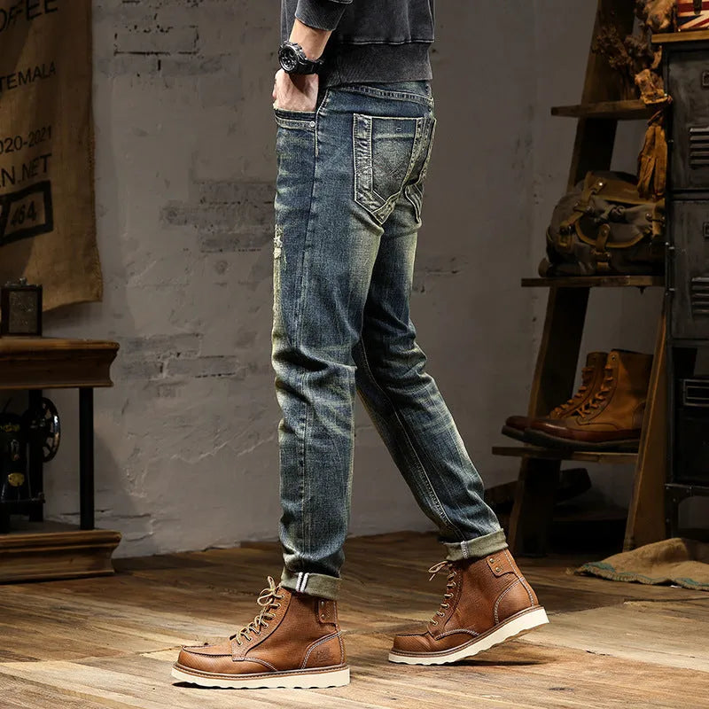 Men's retro blue jeans with stretch fabric in skinny fit style showing zip fly detail