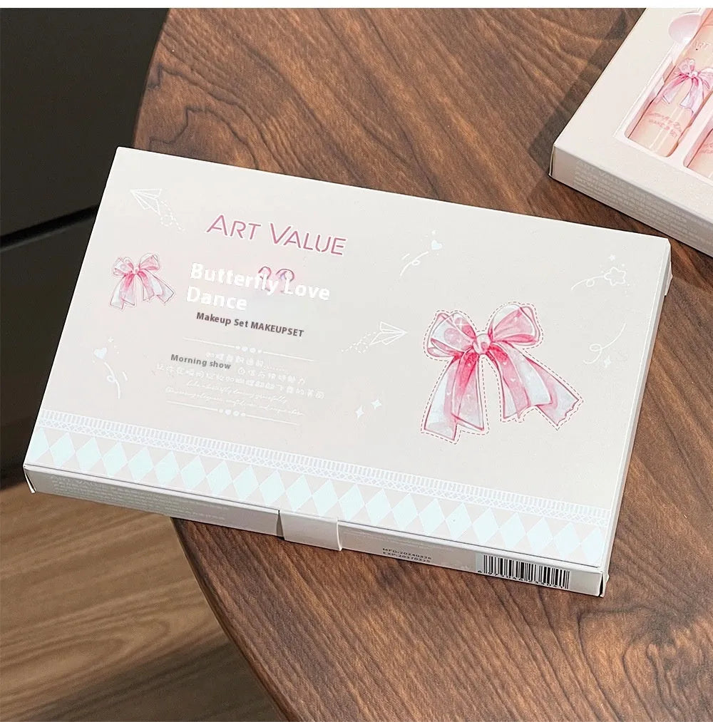Butterfly Box pink makeup set with four matte lip muds, powder blusher, and necklace