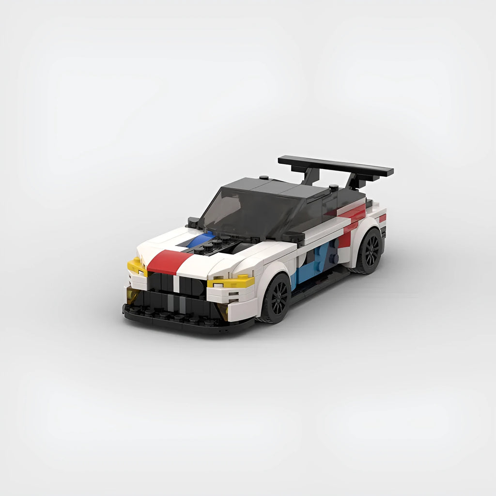 BMW M8 GTE building block car model kit assembled on a flat surface, showing 17cm length and plastic construction