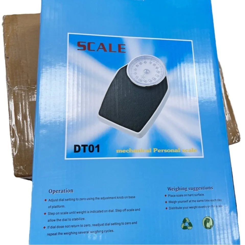Black mechanical body weight scale with large analogue dial showing pointer display.