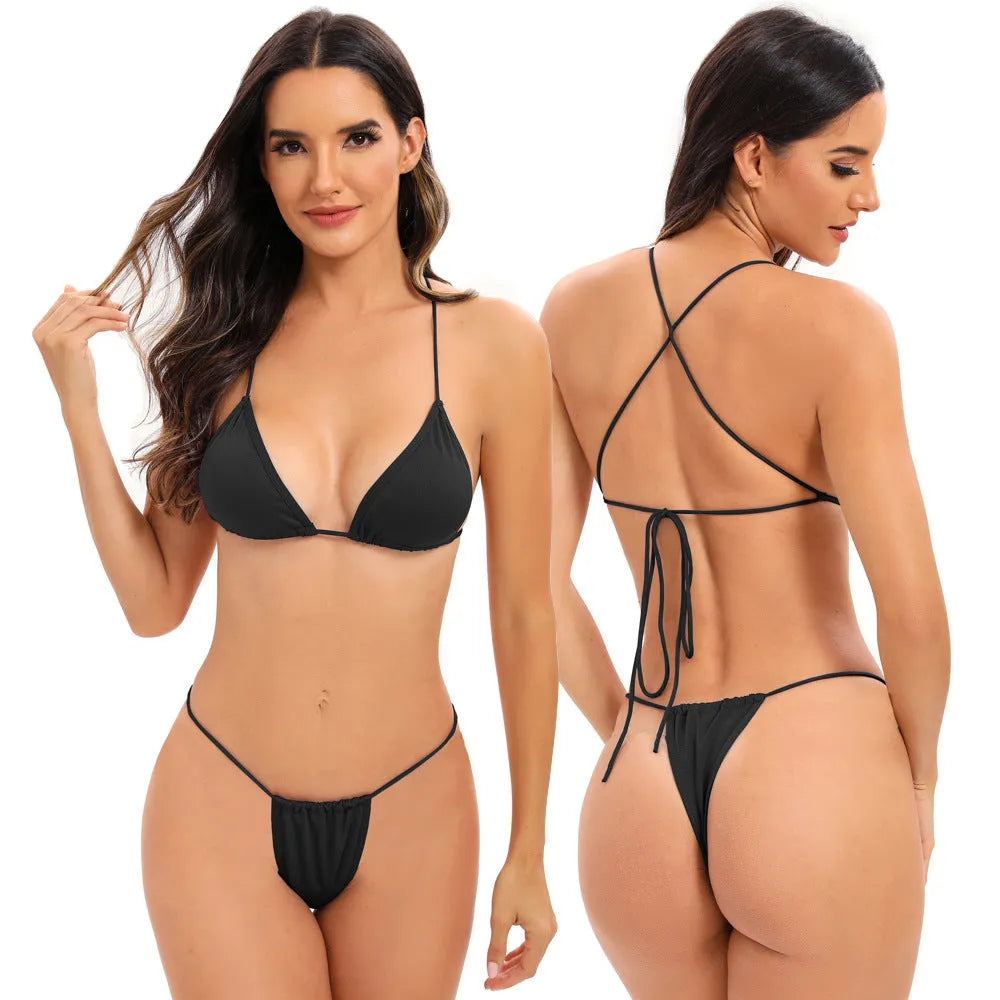 Women's candy coloured cross strap split swimsuit with adjustable multiple straps in striped spandex fabric.