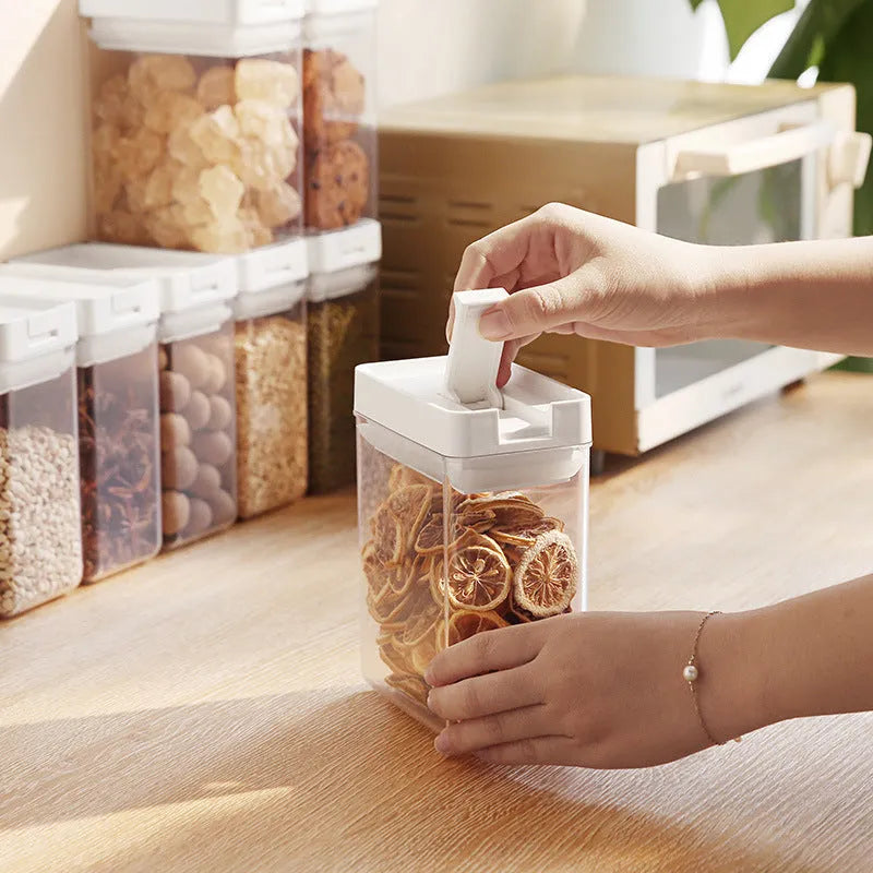 White and transparent 400ml plastic storage container for whole grains, 10.9 x 10 x 7 cm.