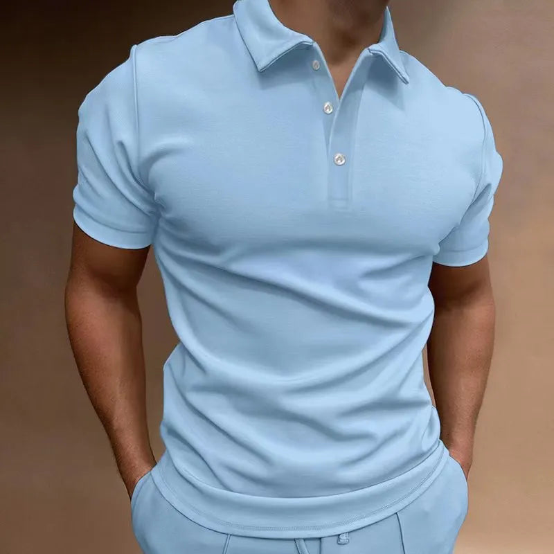 Men's loose fit short sleeve cotton blend T-shirt on a hanger, shown in a light blue colour.