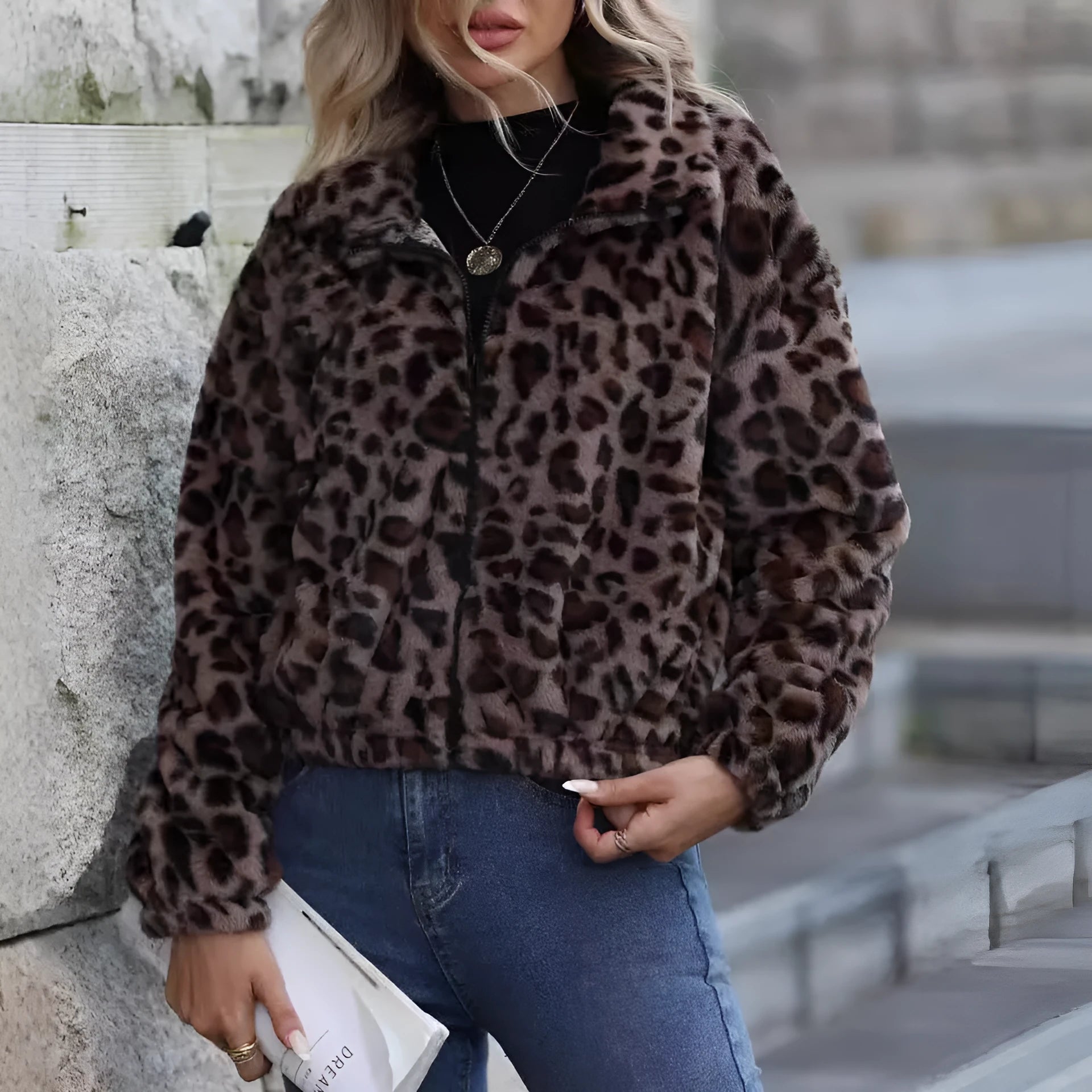 Women's loose leopard print plush coat with front zip and raglan sleeves.
