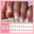 Pink and white gradient detachable nail stickers with starry sky pattern on hands showing medium European square shape