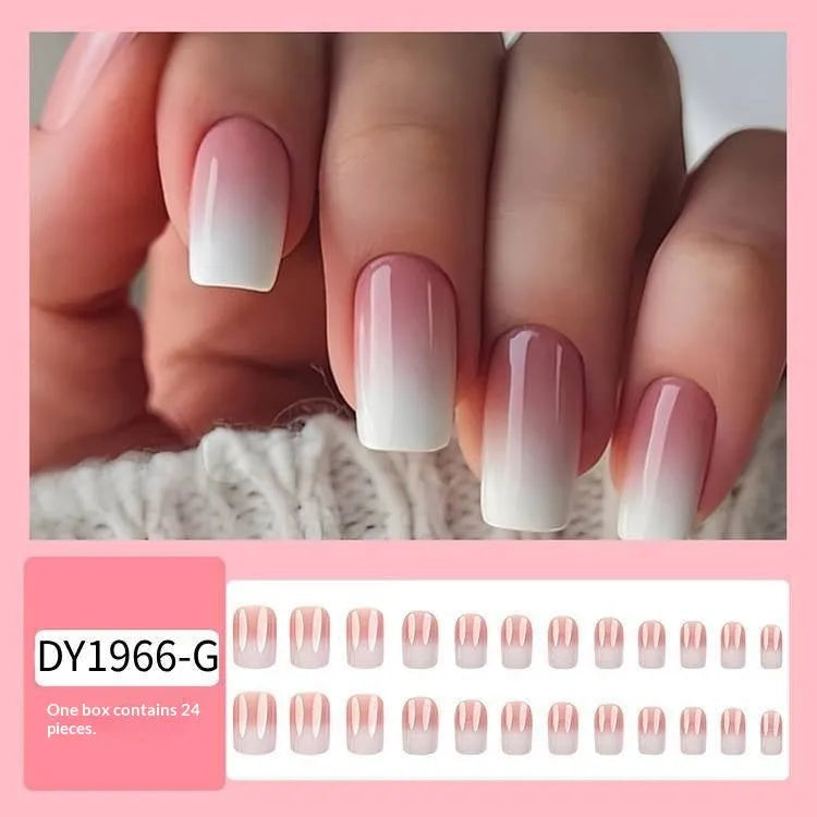 Pink and white gradient detachable nail stickers with starry sky pattern on hands showing medium European square shape