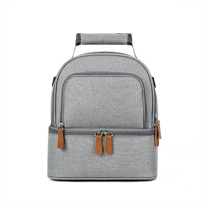 Grey women's thermal insulation backpack made of Oxford cloth with a curved shoulder strap.