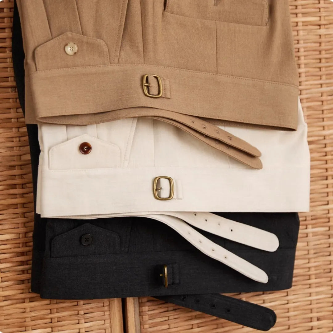 Men's slim fit straight leg business trousers in wrinkle-resistant polyester fabric.