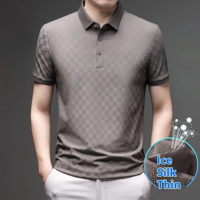Man wearing a black rhombus-patterned short sleeve T-shirt with a slit detail.
