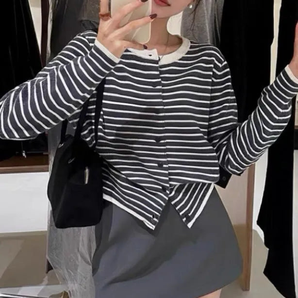French style striped cardigan sweater coat with slim fit and short length on dark grey background