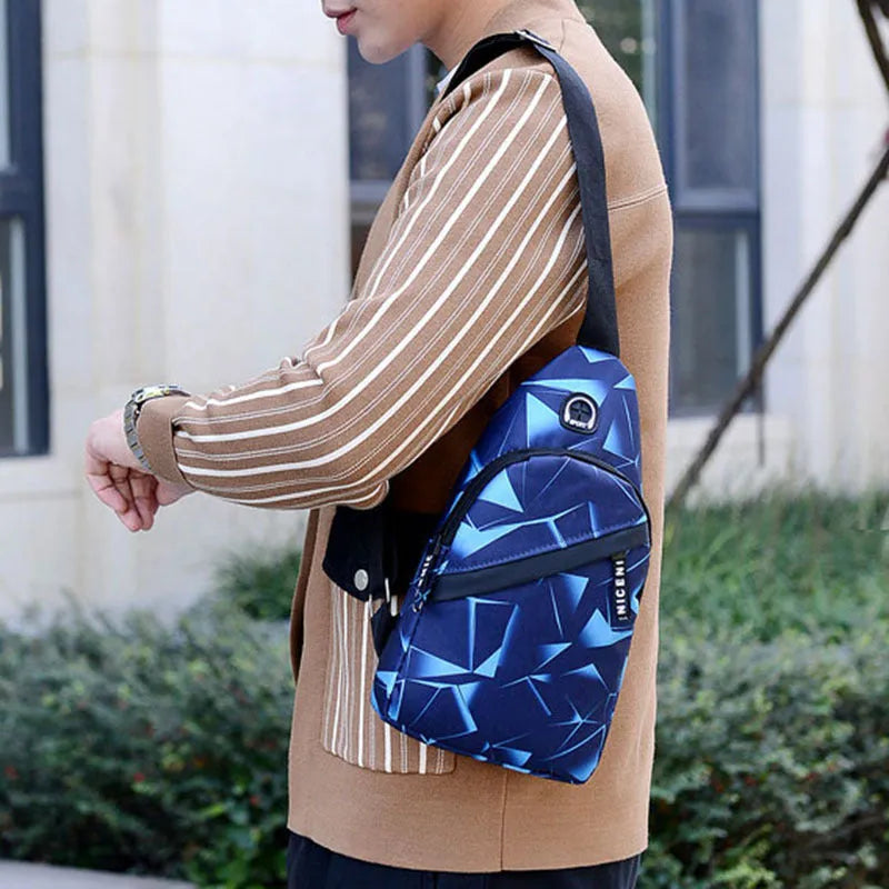 Blue Oxford cloth crossbody chest bag for men with an earphone hole and zipper.
