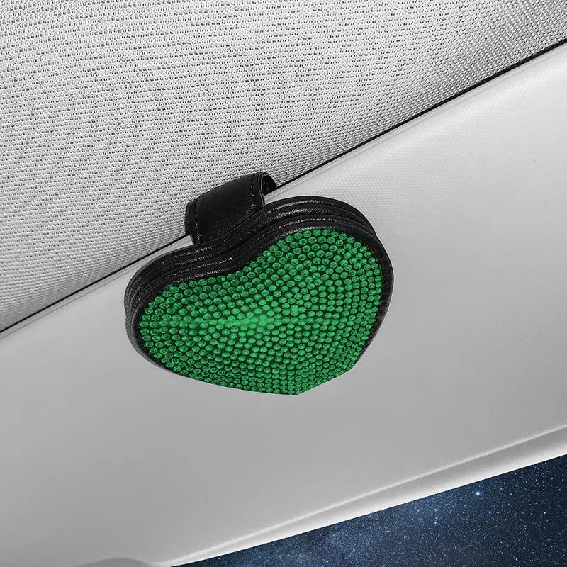Black PU leather car sun visor clip with diamond accents holding sunglasses and a ticket.