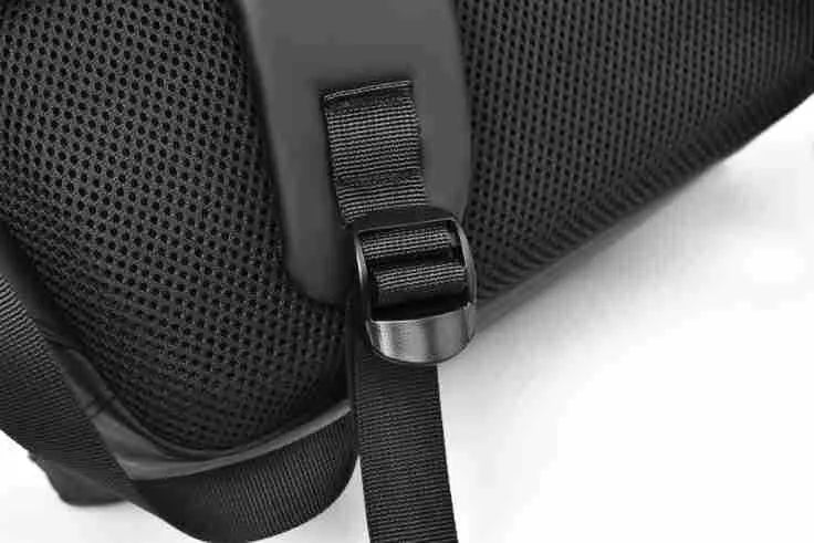 Waterproof PU leather backpack with laptop compartment in black, blue, and grey colour options