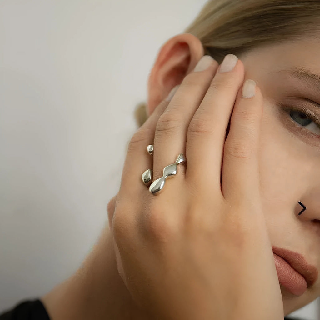 Brass opening ring with spherical elements in gold or silver finish, adjustable women's fashion jewellery