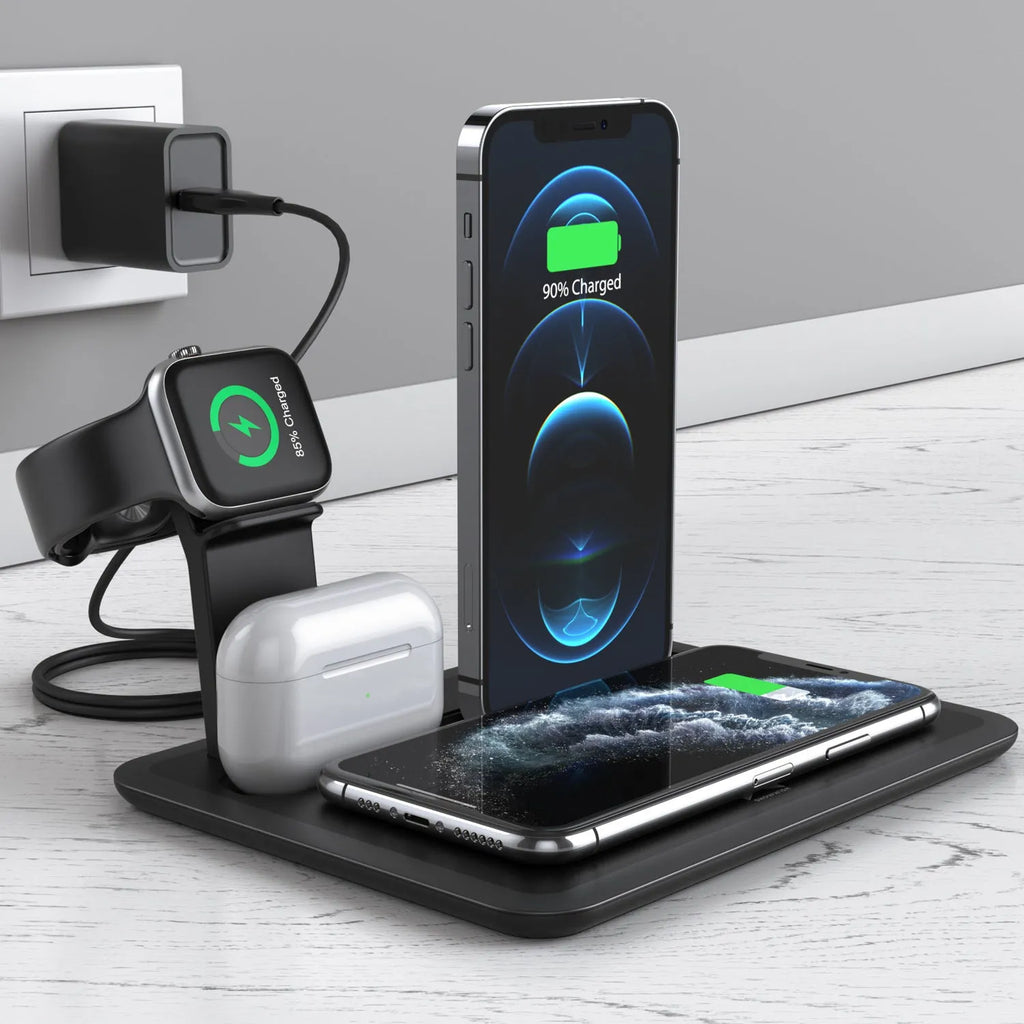 Black desktop wireless charging station with phone on pad, showing watch and headphone charging ports.