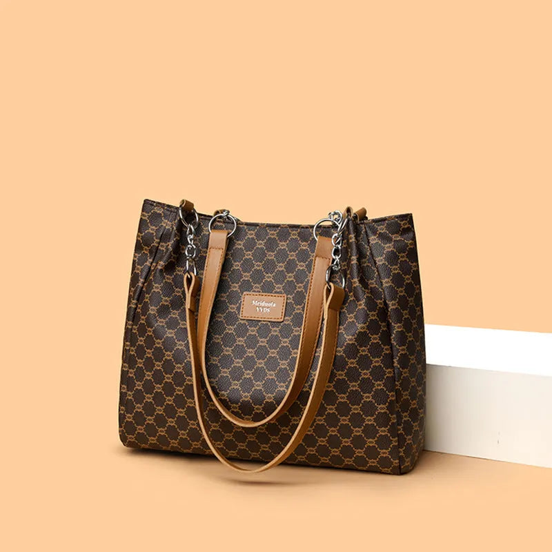Women's retro fashion handbag in soft brown PU leather with polyester lining.