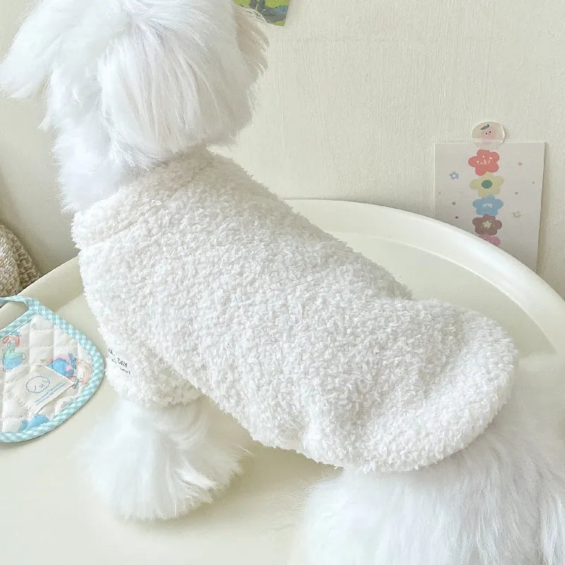 A dog wearing a double-sided cloud velvet thickened jacket in one of six available colours.