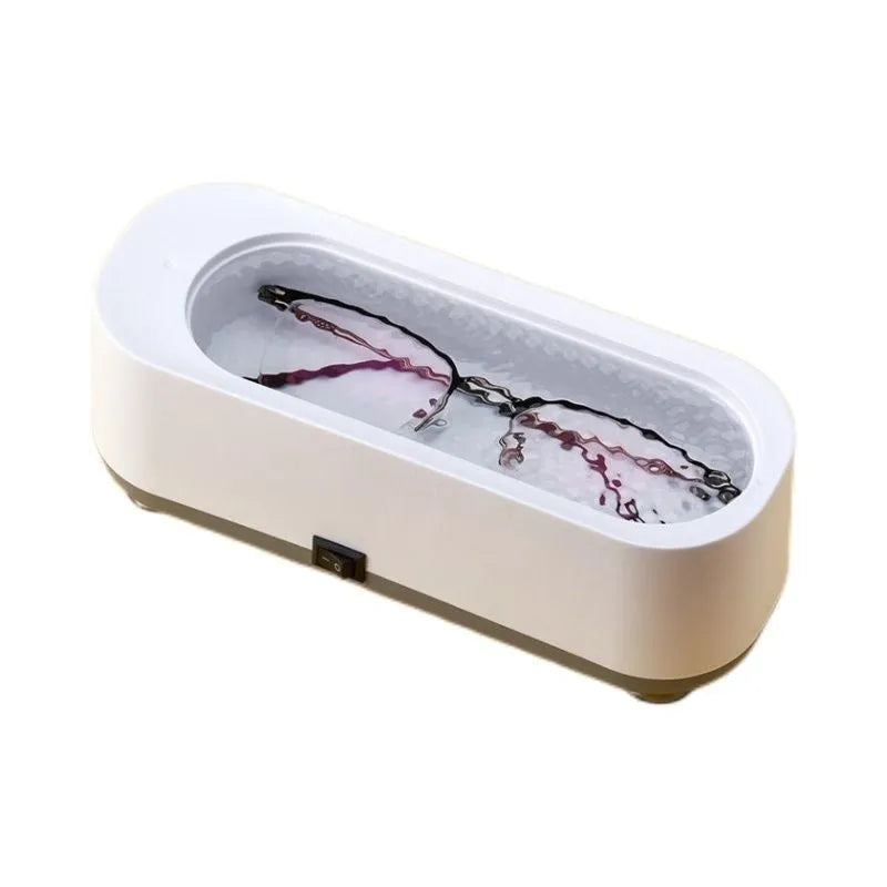 Small purple light ultrasonic glasses washing machine with USB cable and mirror cloth on white background