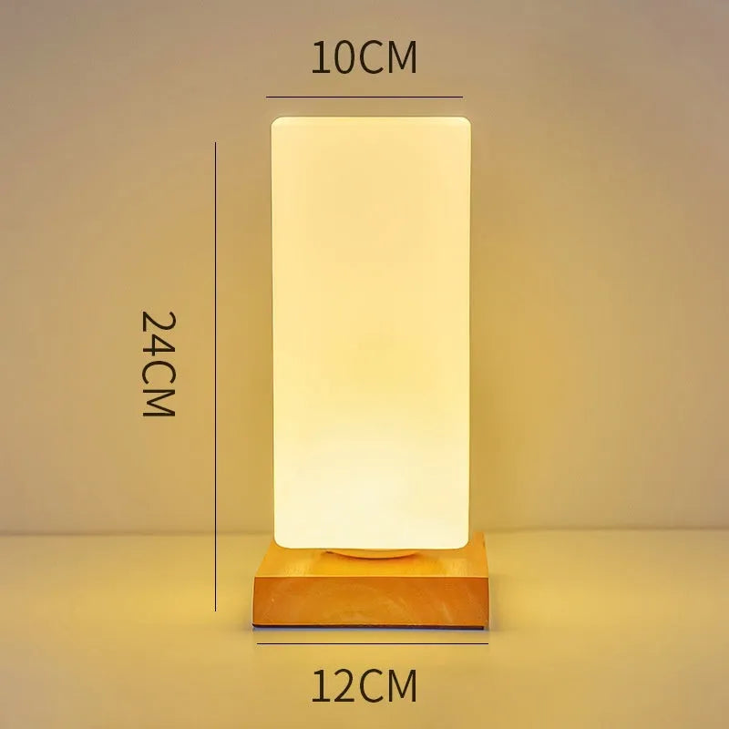 Nordic solid wood USB table lamp in cube shape with touch dimming for bedroom use