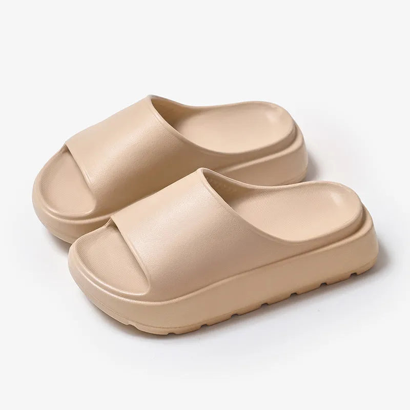 Women's beige fish mouth design beach slippers with a thick 5.5cm EVA sole.