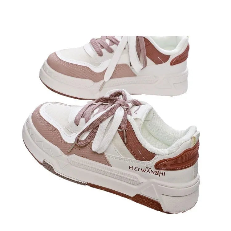 Children's beige board shoes with thick rubber sole, lace-up front, and cross shoulder straps.