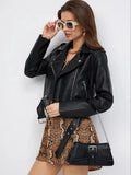 Black women's street fashion PU imitation leather coat on a hanger