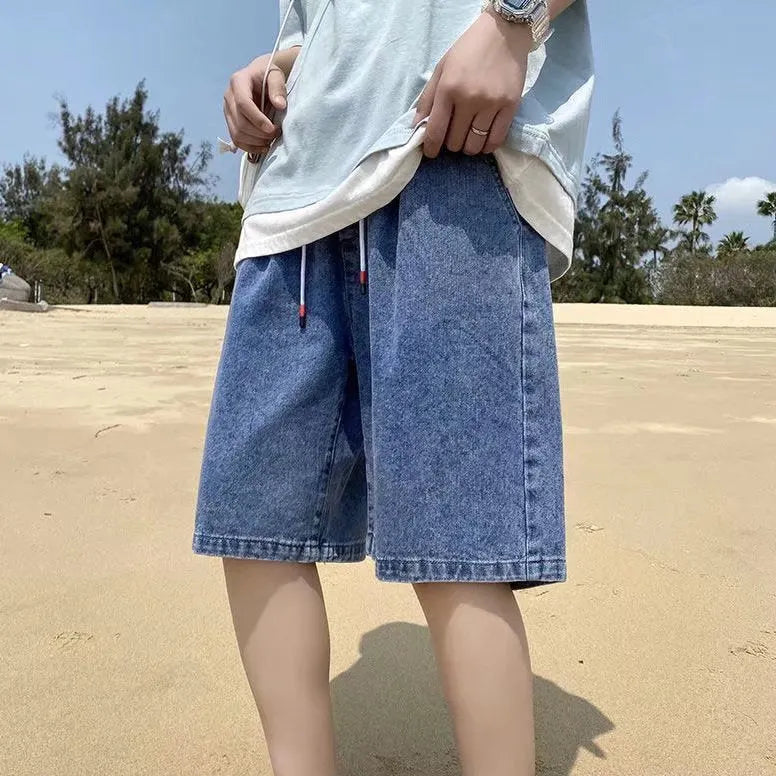 Men's loose straight casual cotton denim shorts in dark blue, front view
