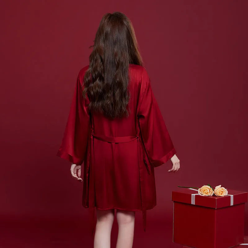 Red long sleeve polyester sleepwear set for a man and woman, presented as a wedding dowry gift.