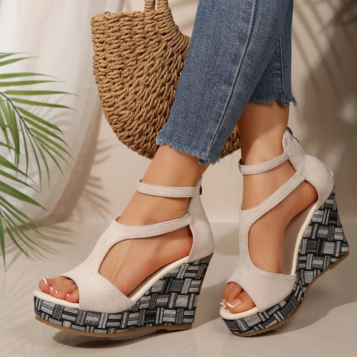 Women's cream white ankle-strap sandals with thick rubber sole and buckle fastening.