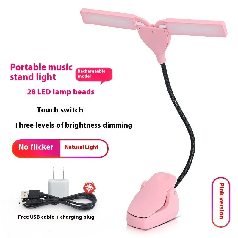 Black rechargeable music stand lamp with 28 LEDs lit up on a metal music stand.