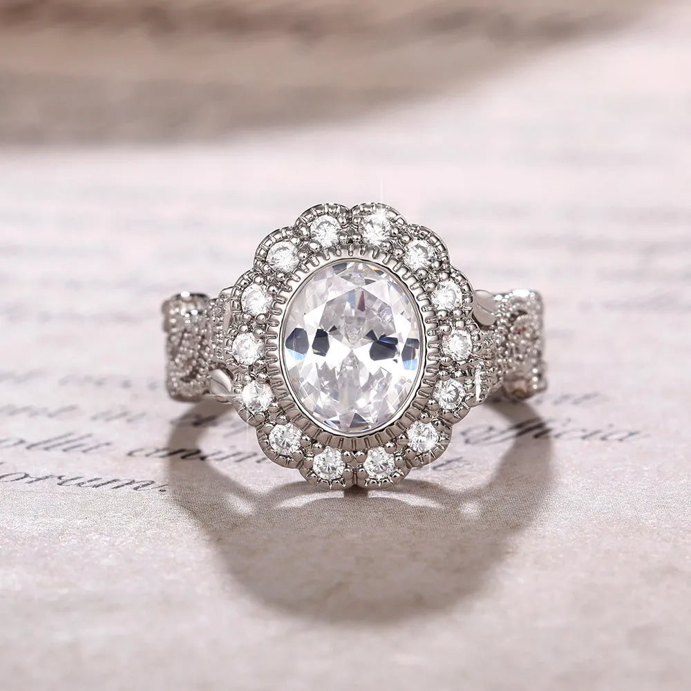 Geometric women's ring with round zircon elements in white gold colour on copper