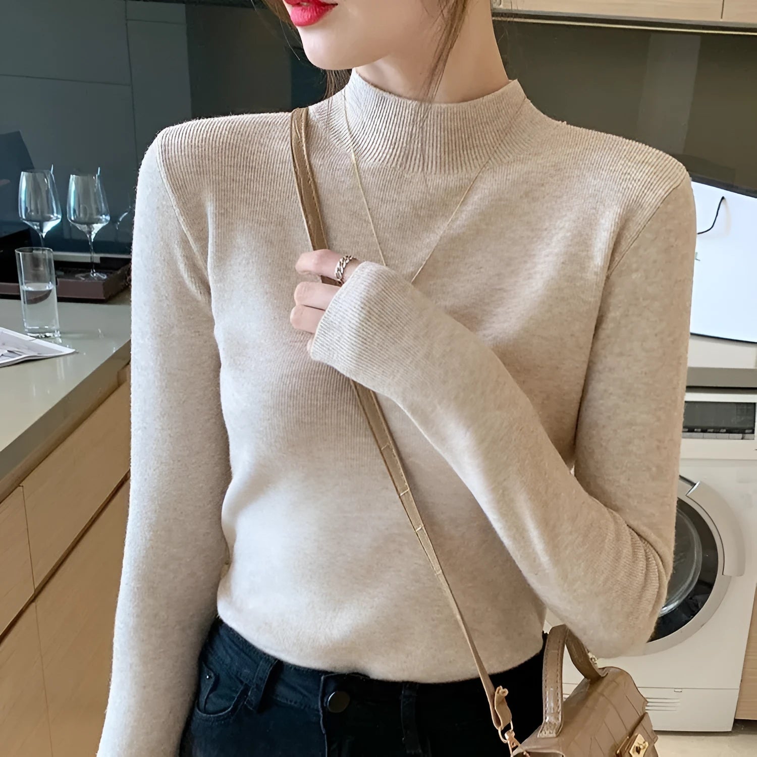 Slim fit viscose long sleeve top for women in apricot colour, showing front view.