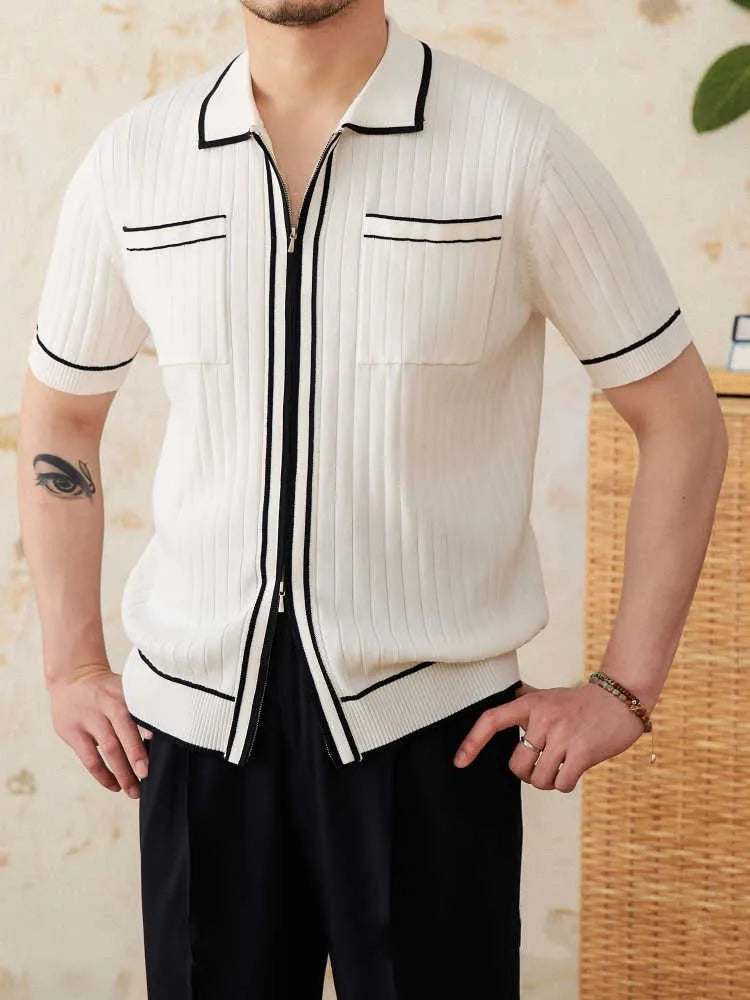 Slim black elastic lapel polo shirt on a hanger, showing short sleeves and knit texture.