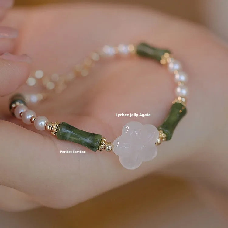 Chinese style bamboo joint bracelet with shell pearls, Hetian jade, and copper connectors