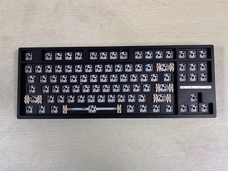 DIY hot-swappable mechanical keyboard kit with plastic case in multiple colour options