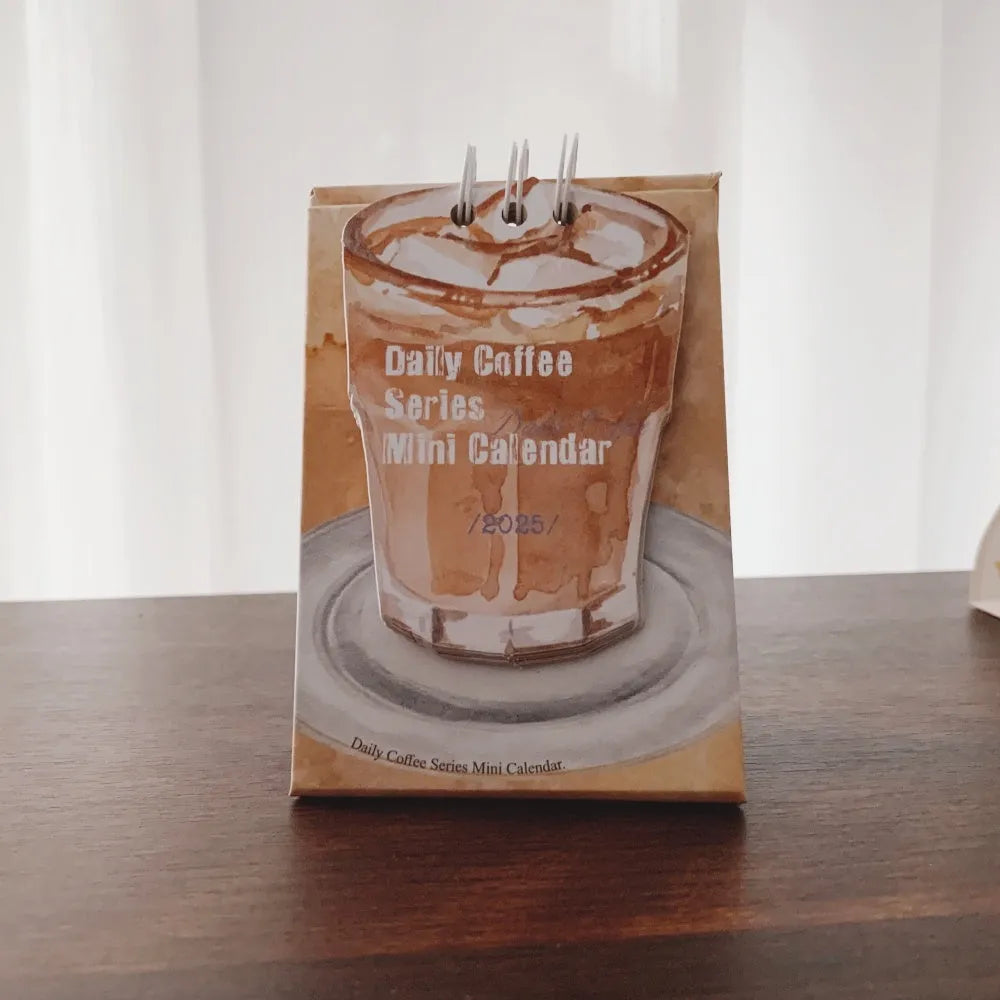 2025 mini desk calendar set showing four different paper calendar designs including Coffee Time theme