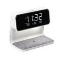 White 3-in-1 bedside lamp with wireless charging pad, LCD clock screen, and touch dimming controls