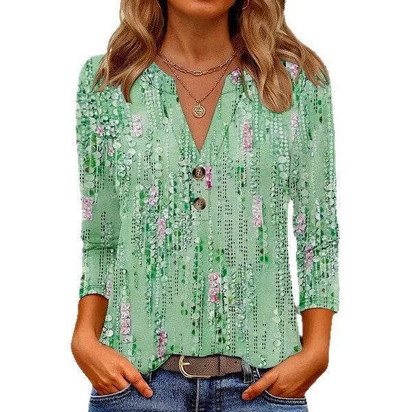 Women's loose fit casual top with a 3D printed pattern and a V-neck.