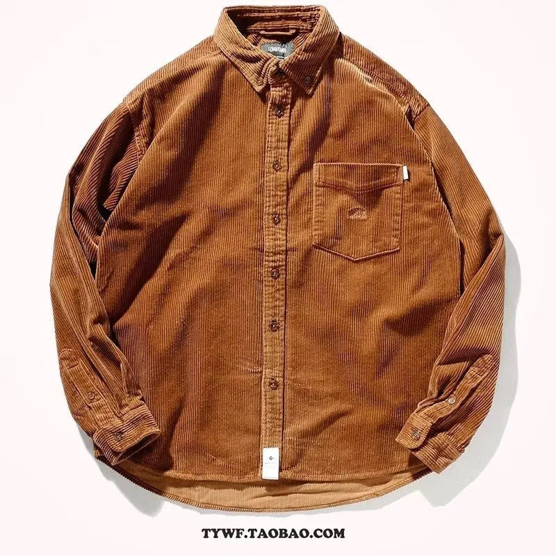 Caramel and grey loose fit long sleeve corduroy cardigan shirt on a hanger.