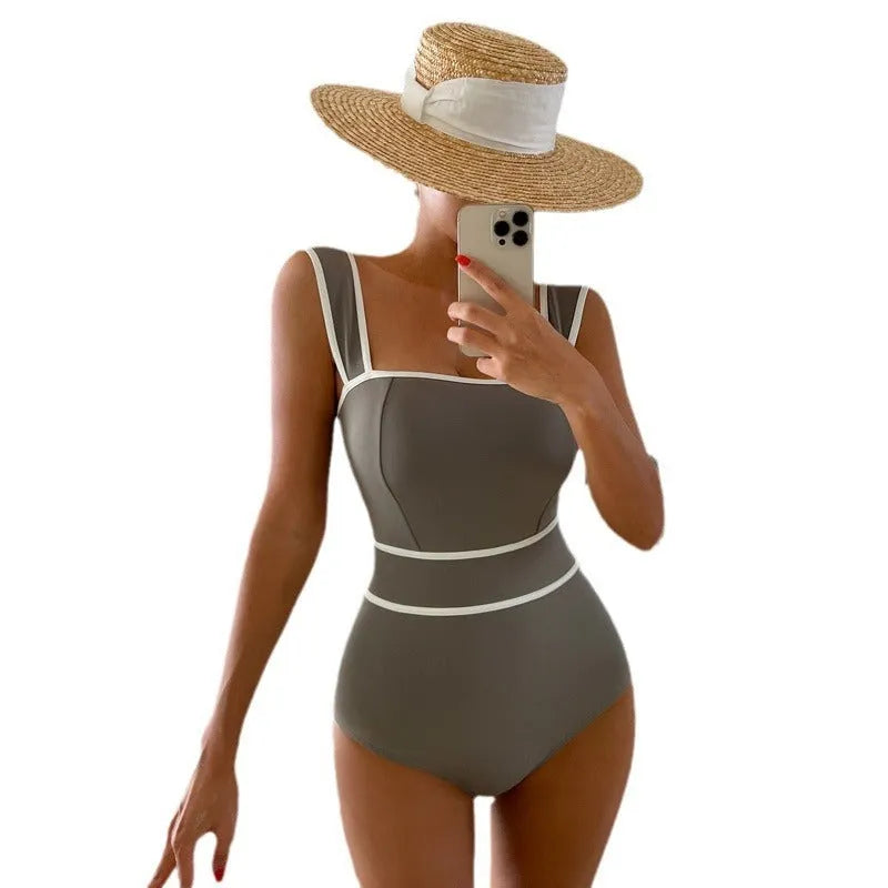 Women's backless one-piece swimsuit with lace-up fastening in white, black, or grey