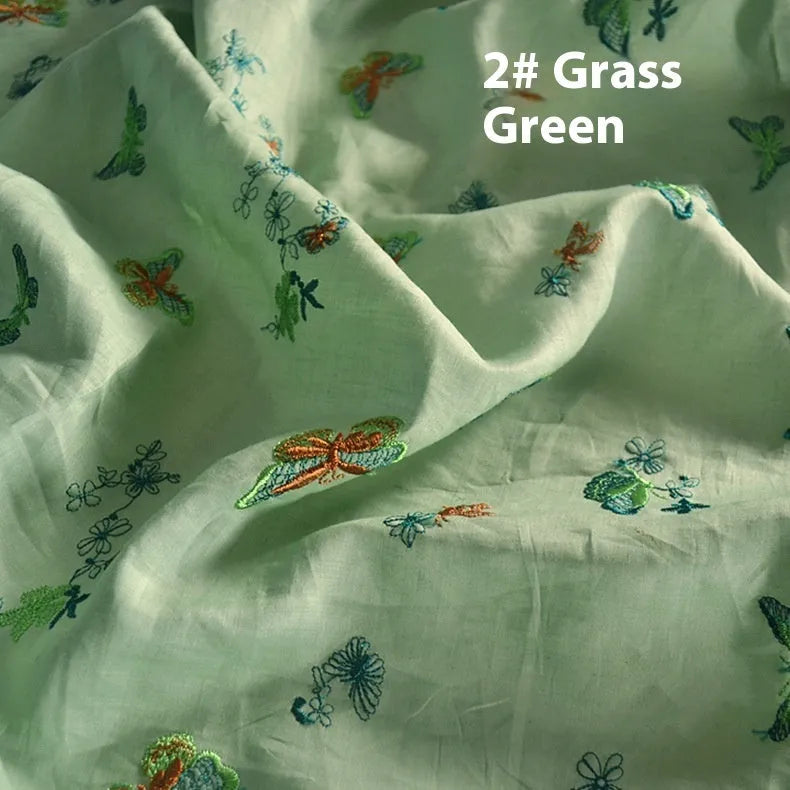 Pure ramie fabric in beige, grass green, and dark green colours, shown with a 1 metre length.