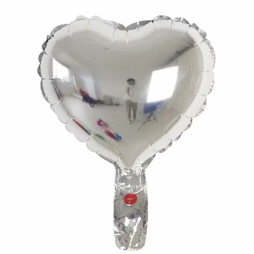 Pack of five sparkling silver aluminium foil peach heart-shaped balloons for party décor.